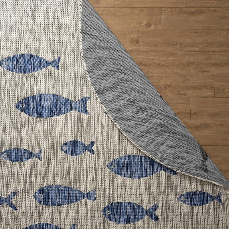 Isola Tropical Indoor/Outdoor Area Rug by Porch & Den