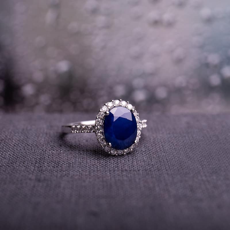 Diffused Sapphire and 2/5ct TDW Diamond Oval Halo Ring in 14k White Gold by Miadora