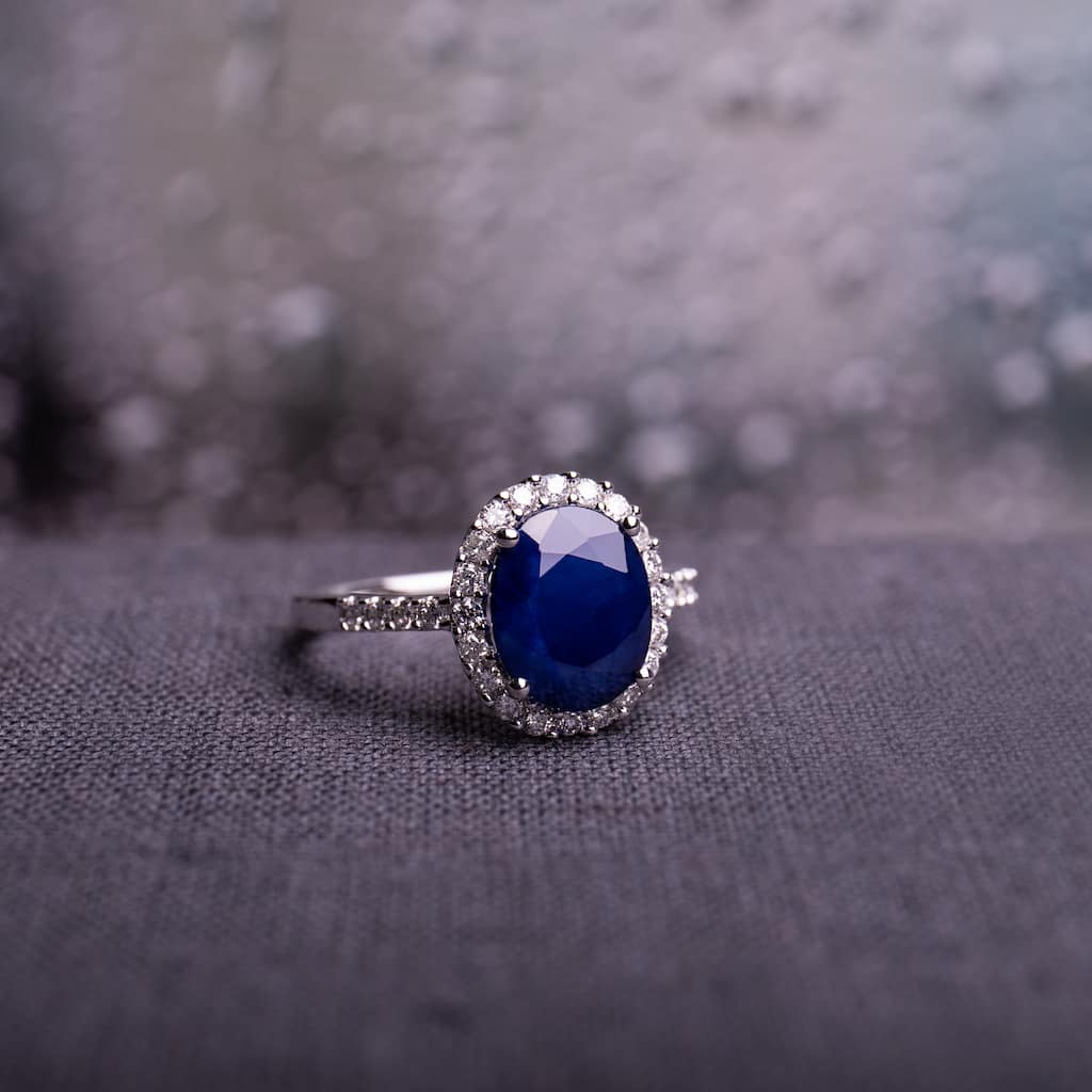 Diffused Sapphire and 2/5ct TDW Diamond Oval Halo Ring in 14k White Gold by Miadora