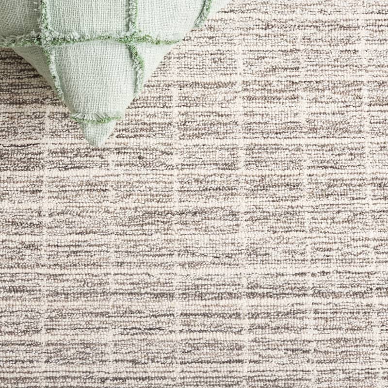 SAFAVIEH Handmade Ebony Peigi Contemporary Wool Rug