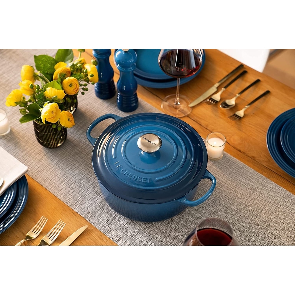 https://ak1.ostkcdn.com/images/products/is/images/direct/2ee9e640a1bc4832e24f699a8d156e9cffa8ee2f/Le-Creuset-Enameled-Cast-Iron-Round-Dutch-Oven---5.5-Quart.jpg