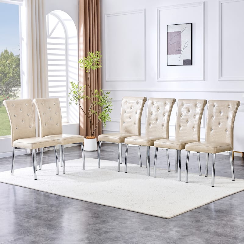 A set of 4 white and black vintage crocodile leather cushioned dining chairs, featuring crystal clasp design and leather