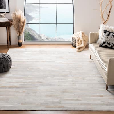 SAFAVIEH Handmade Studio Leather Daniele Natural Hide Leather Rug