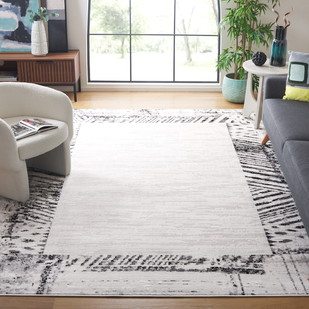 SAFAVIEH Skyler Otelia Modern Abstract Border Rug