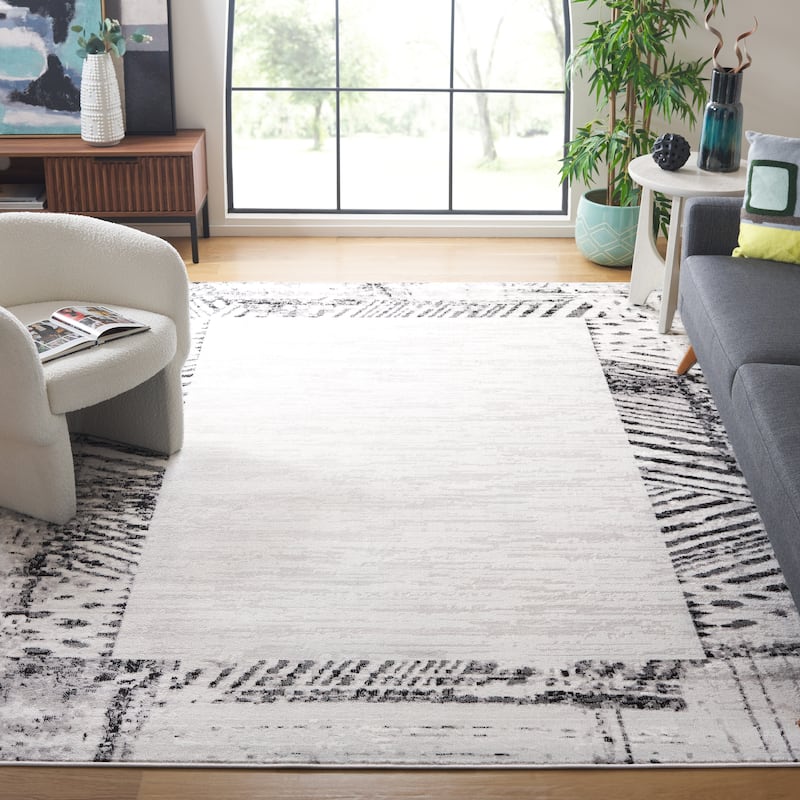 SAFAVIEH Skyler Otelia Modern Abstract Border Rug
