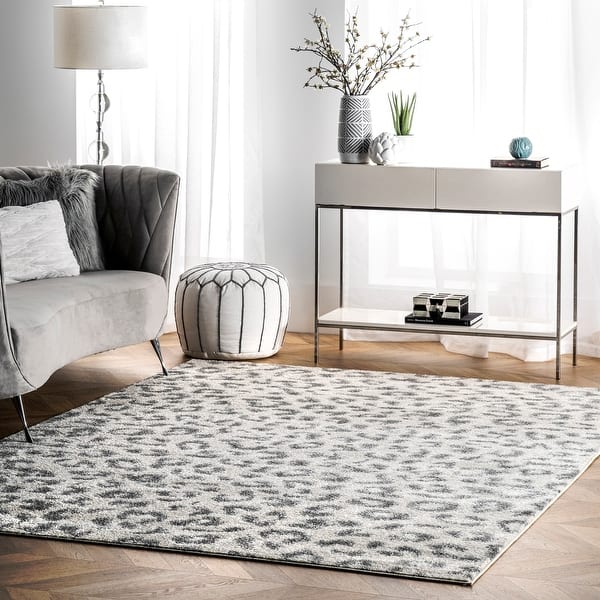 https://ak1.ostkcdn.com/images/products/is/images/direct/2f28ad6c244eca4b0f8697bc322c04558ac49917/nuLOOM-Grey-Modern-Leopard-Spotted-Area-Rug.jpg?impolicy=medium