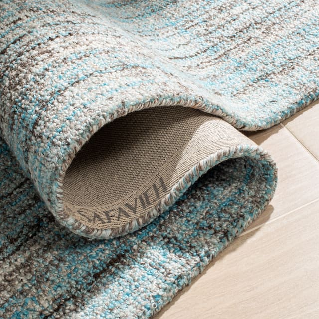 SAFAVIEH Handmade Abstract Nettie Modern Viscose Rug