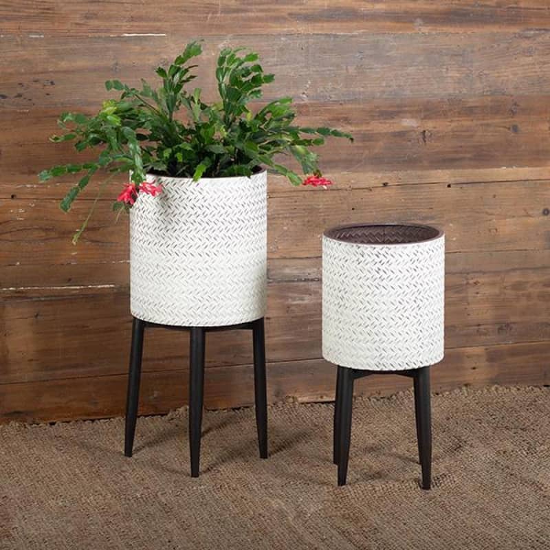 Set Of 2 Washed White Metal Pots On Brown Metal Legs Plant Stand