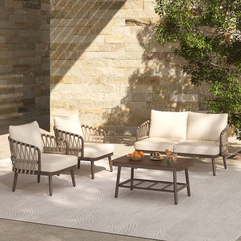 Four-Piece Outdoor Patio Set‌ – Metal Frame Chairs With Woven Rope U-Shaped Backrests, Includes Thick Cushions And Coffee Table.