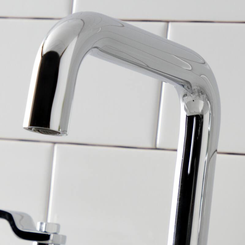 Kingston Brass Whitaker Two-Handle 3-Hole Deck Mount Widespread Bathroom Faucet with Push Pop-Up