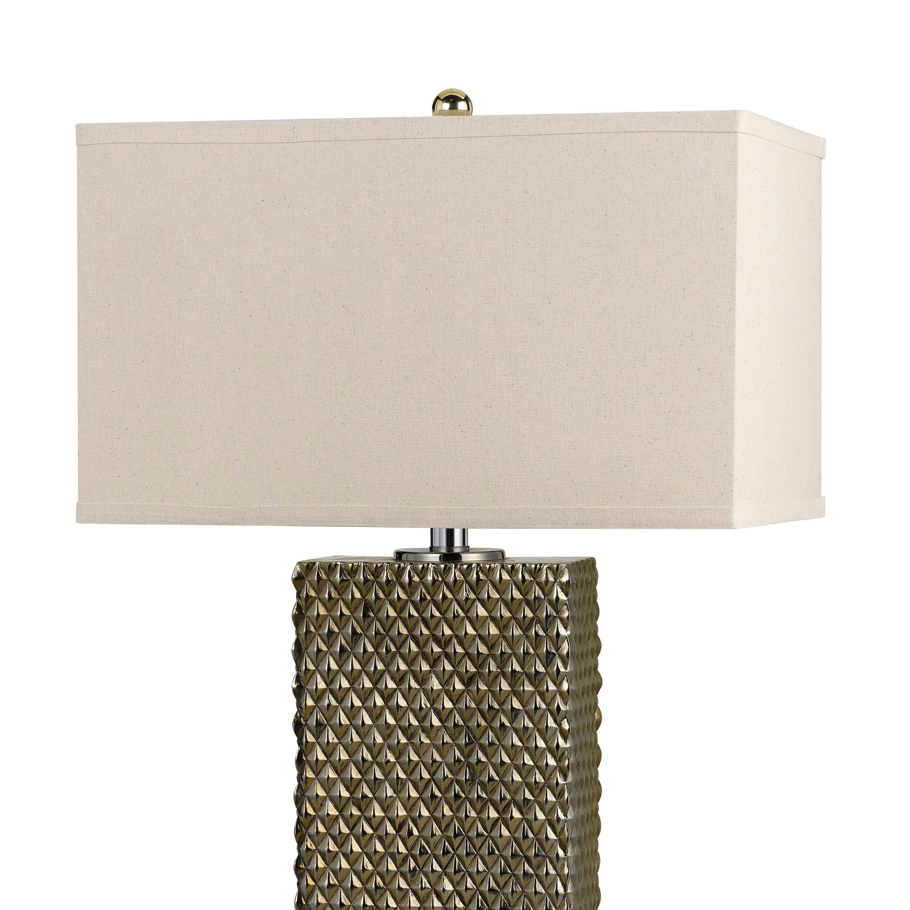 cream and gold lamp