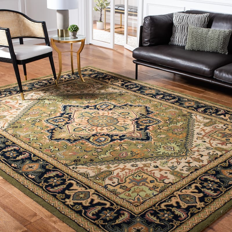 SAFAVIEH Handmade Heritage Carrol Traditional Oriental Wool Rug - 6' x 9' - Green/Light Brown