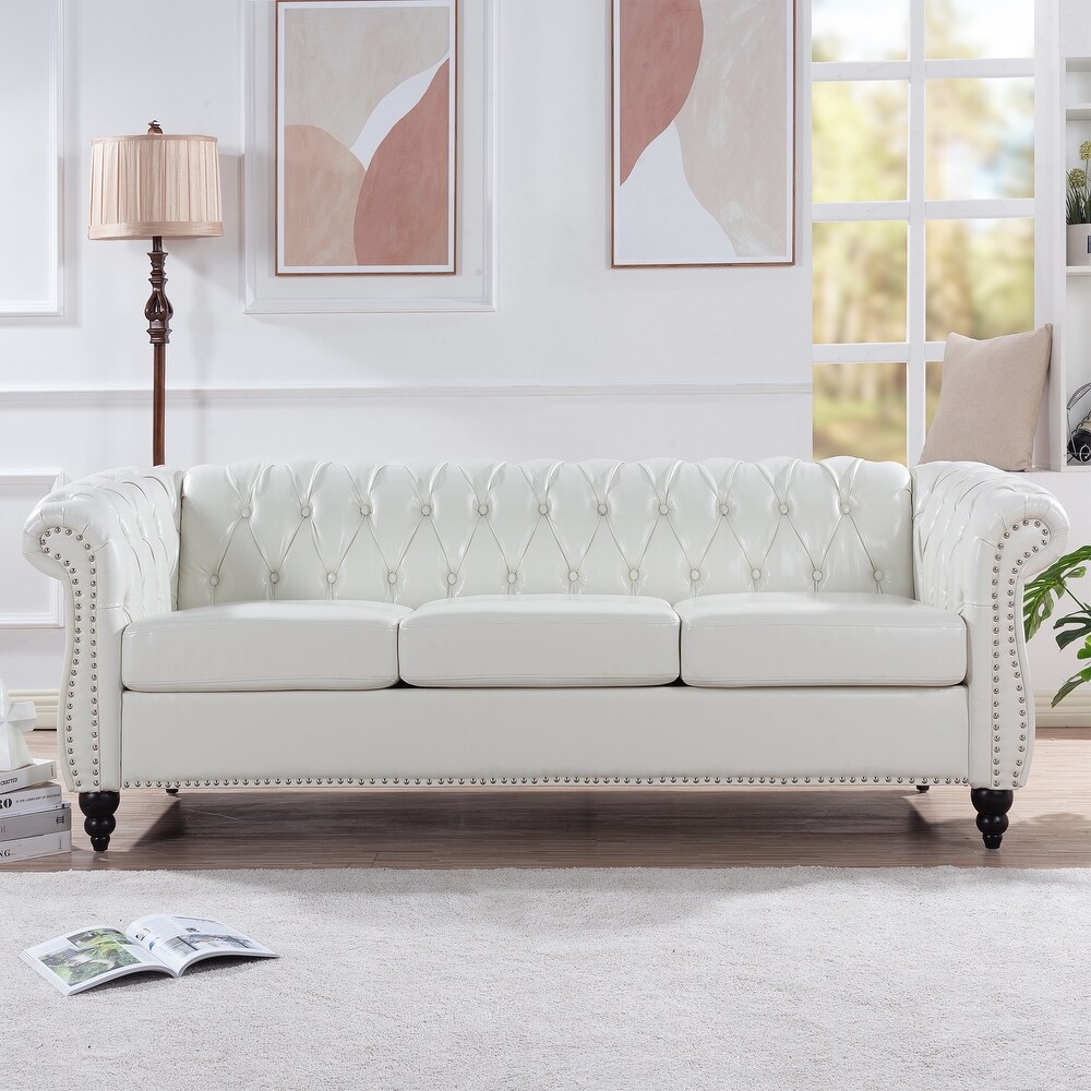 White sofa with on sale nailhead trim