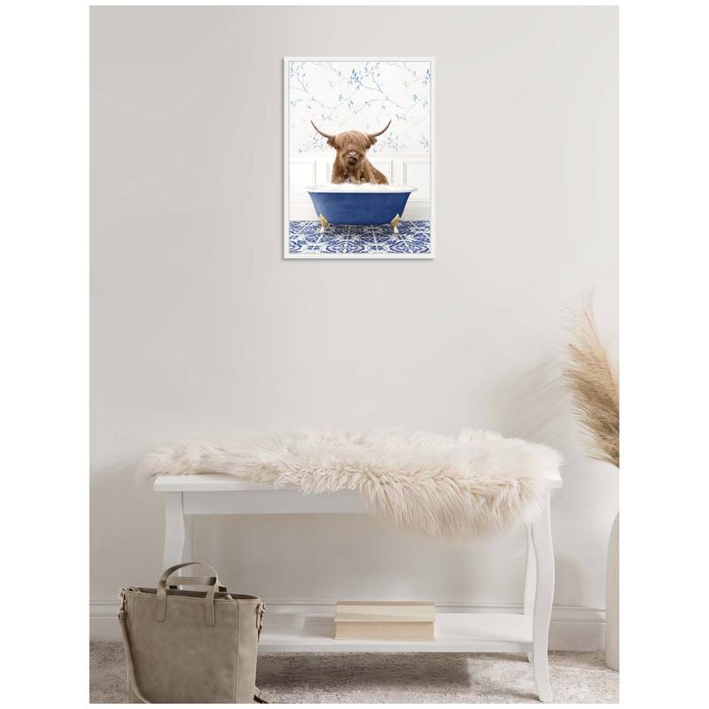Kate and Laurel Sylvie Highland Cow in Eclectic Blue Bathtub Framed Canvas by Amy Peterson