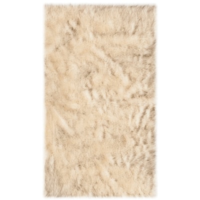 SAFAVIEH Faux Sheep Skin Tera Shag Solid Rug