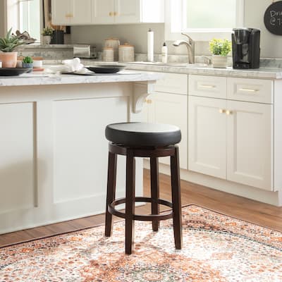 Dorothy Black Wood 25-Inch Backless Faux Leather Swivel Counter Stool
