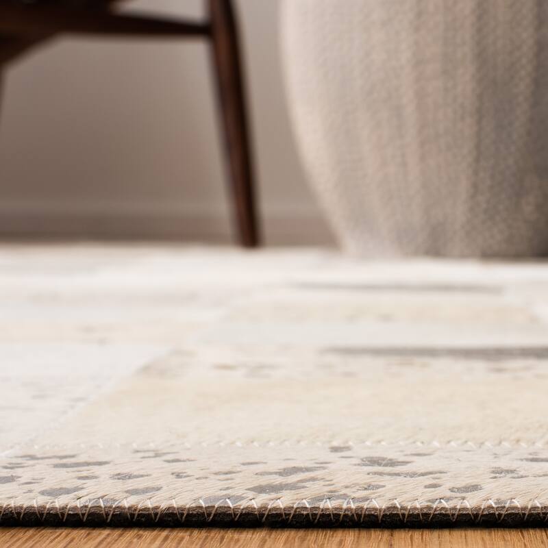 SAFAVIEH Handmade Studio Leather January Modern Leather Rug