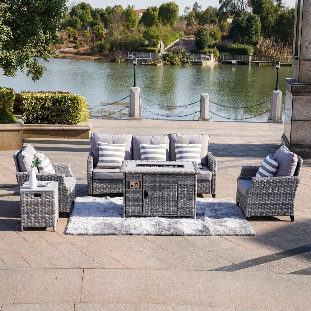 Rattan sofa sales with fire pit