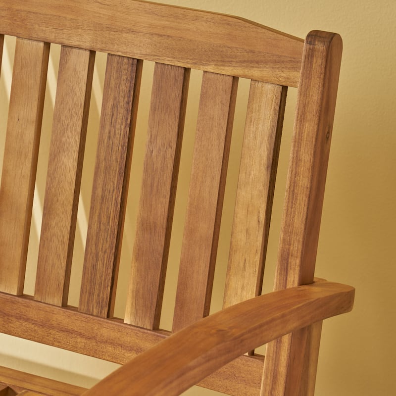 Roomfitters Outdoor Wooden Rocking Loveseat with Slatted Backrest, Wide Armrests and Classic Curved Base