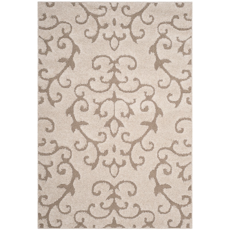 SAFAVIEH Florida Shag Tjabbe Scroll Area 1.2-inch Thick Rug - 6' x 9' - Cream/Beige