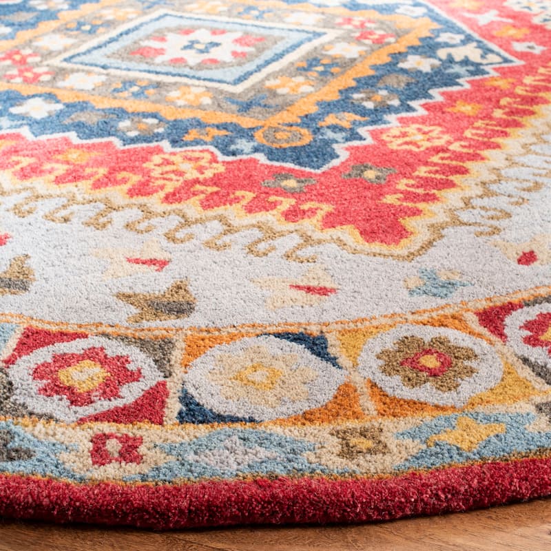 SAFAVIEH Handmade Heritage Striped Border Traditional Oriental Wool Rug