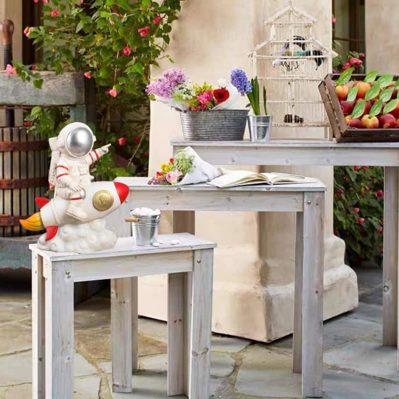 10.5" Astronaut Sitting on a Rocket Outdoor Garden Statue