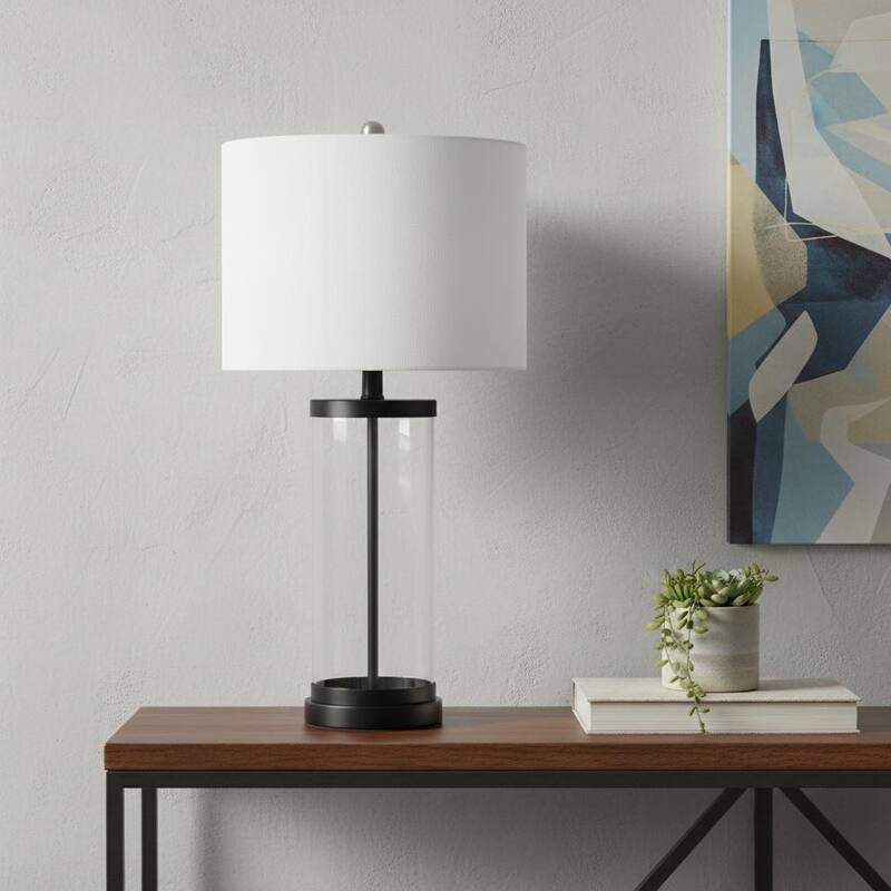 HomeRoots 28" Clear And Black Glass And Metal Table Lamp With White Drum Shade - 14.00 in. x 27.50 in. x 14.00 in. - Black/Clear/White - 14.00 in. x 27.50 in.  x 14.00 in.