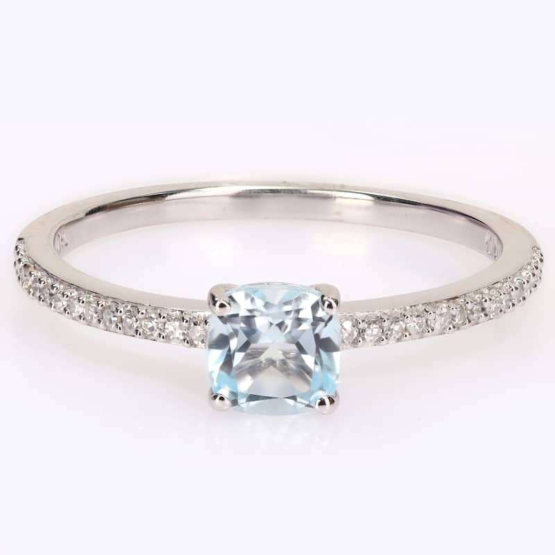 Miadora 10k White Gold Cushion-cut Blue Topaz and 1/10ct TDW Diamond Birthstone Ring