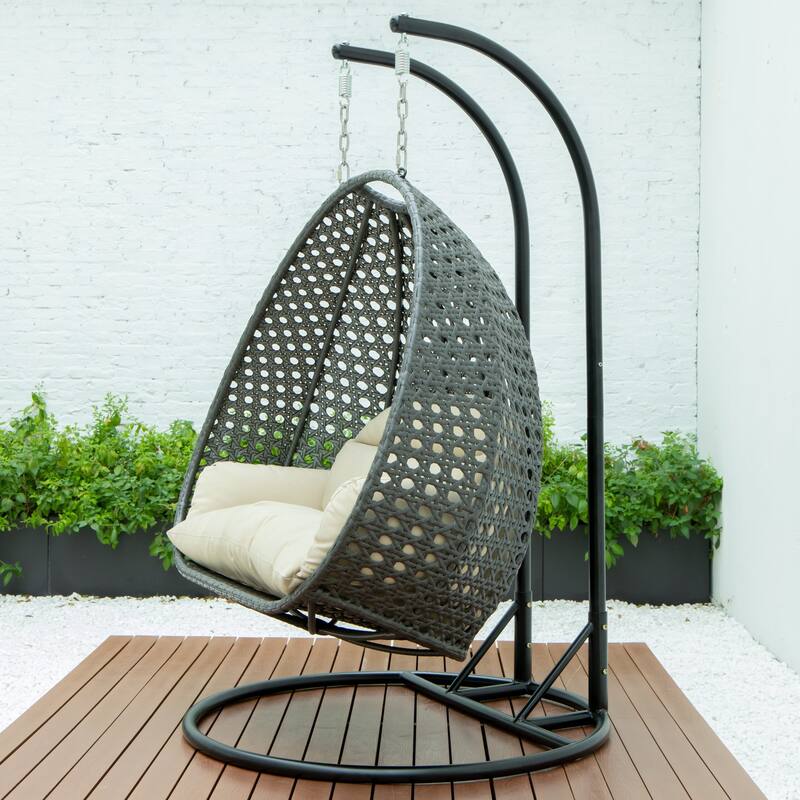 LeisureMod 2-Person Hanging Egg Swing Chair with Metal Stand - Handcrafted Charcoal Wicker, Patio Hammock Lounger with Cushions