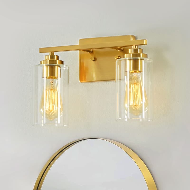 KAWOTI Rive 2-Light Dimmable Bathroom Vanity Light with Clear Glass Shade - Antiqued Brass