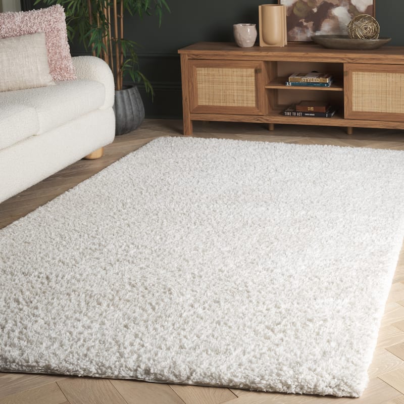 SAFAVIEH Handmade Sheep Shag Dochia Solid Polyester Rug
