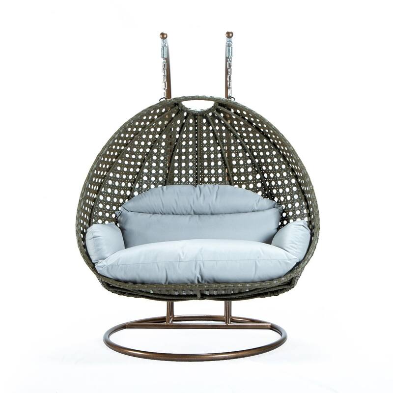 LeisureMod 2-Person Hanging Egg Swing Chair with Metal Stand - Handcrafted Beige Wicker, Patio Hammock Lounger with Cushions