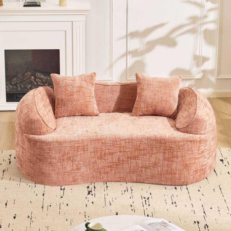 Curved 2 person compress sofa. It has armrests on both sides, comes with two pillows,is suitable for small - sized apartments