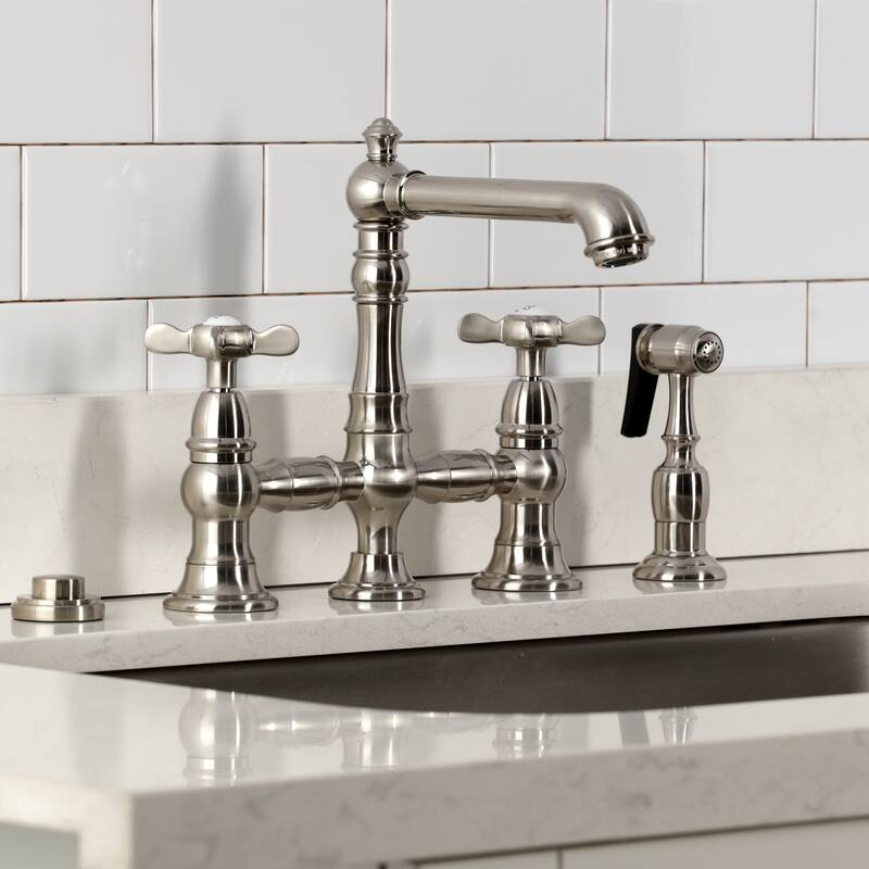 Kingston Brass Essex Two-Handle 4-Hole Deck Mount Bridge Kitchen Faucet with Brass Side Sprayer
