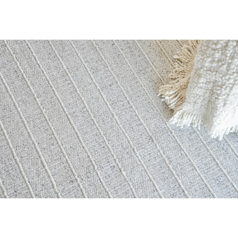 Nova Indoor/Outdoor Flatweave PET yarn Ivory Area Rug.