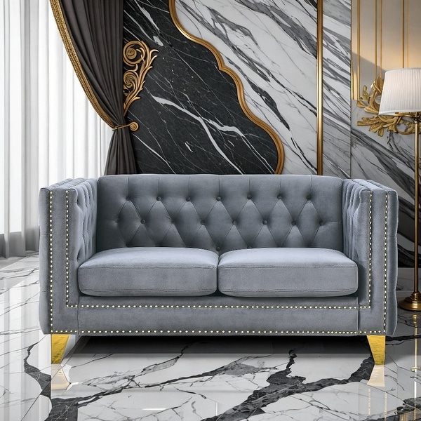 Grey top tufted couch