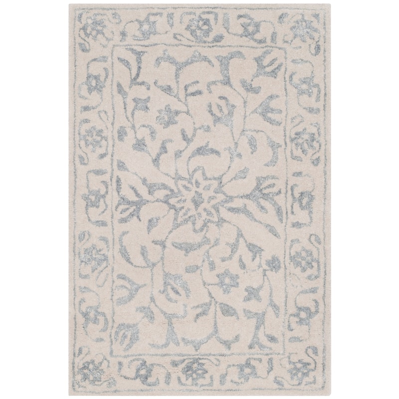 SAFAVIEH Handmade Glamour Etiennette Modern Viscose Rug - 2' x 3' - Silver/Ivory