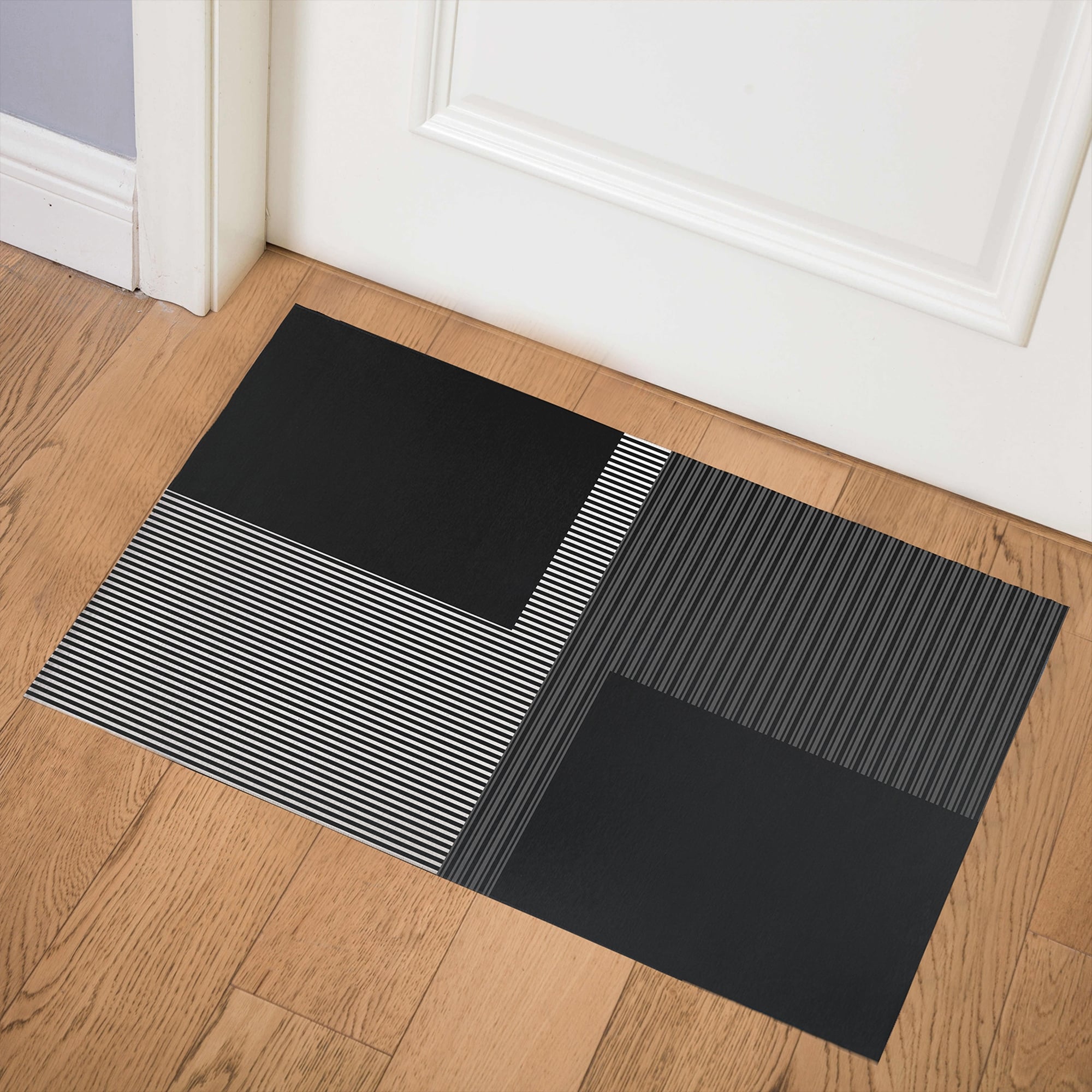 https://ak1.ostkcdn.com/images/products/is/images/direct/319efc5d413d6de5a8408f548aee5f45d9f21e55/FIGARO-BLACK-AND-WHITE-Indoor-Floor-Mat-By-Becky-Bailey.jpg