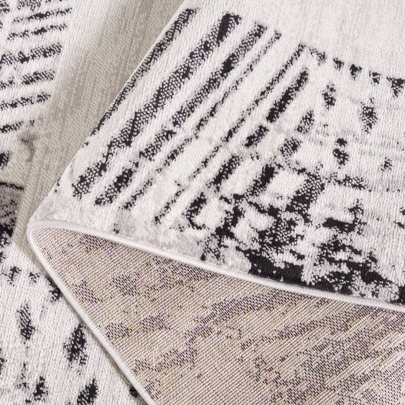 SAFAVIEH Skyler Otelia Modern Abstract Border Rug