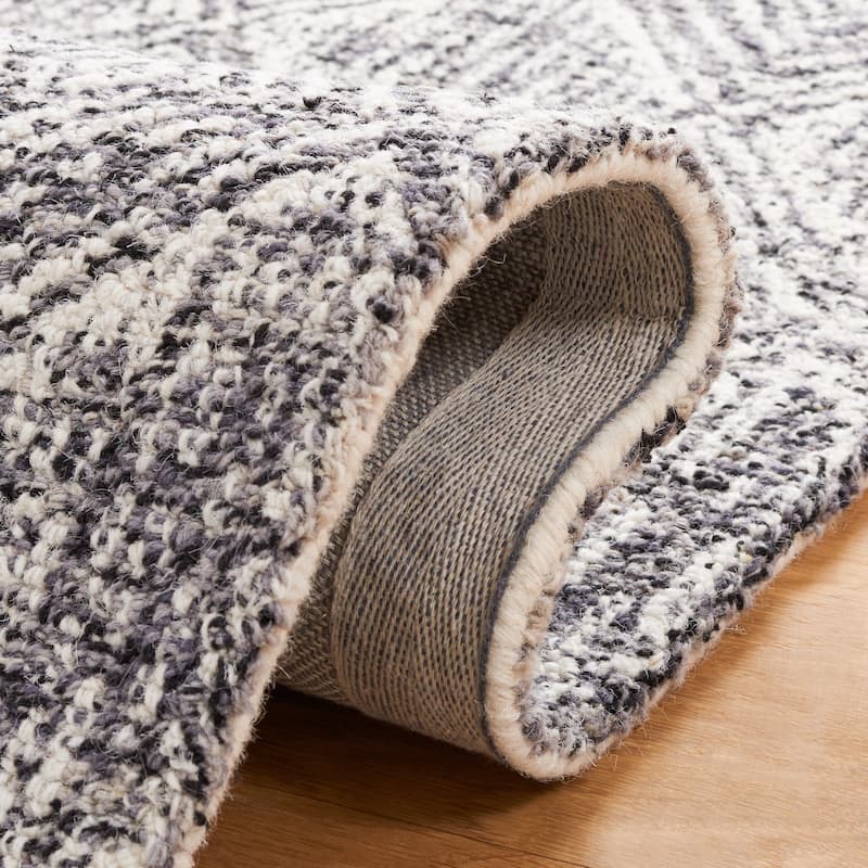SAFAVIEH Handmade Ebony Eduina Modern Rug