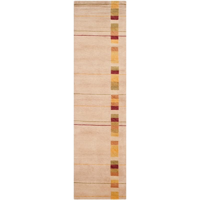 SAFAVIEH Couture Hand-knotted Tibetan Fayge Modern Wool Rug
