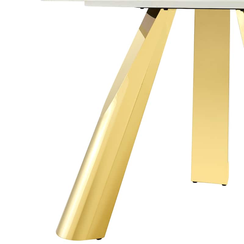 A 42-Inch Round Table with Stainless Steel Legs and a Marble Top, Perfect for 4 to 6 People.