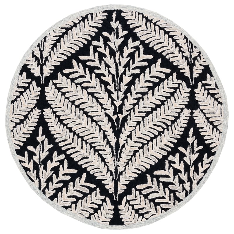SAFAVIEH Handmade Capri Kert Wool Rug - 5' Round - Black/Ivory