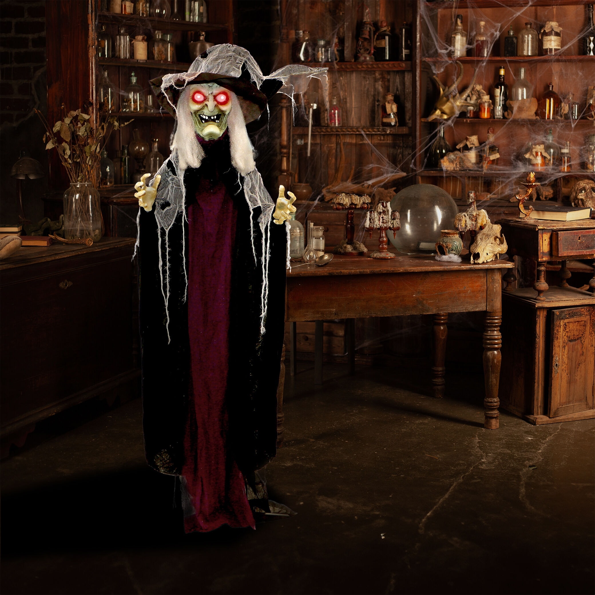 Haunted Hill Farm 6.9-Ft. Poseable Talking Witch with Red Eyes