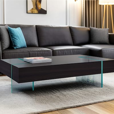 HomeRoots 53" Black And Clear Wood And Glass Sled Coffee Table - 53 in. x 16 in. x 28 in.