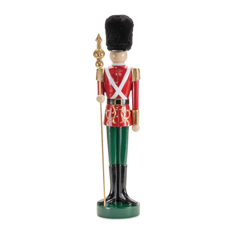 HomeRoots 19" Black Red And Green Resin Christmas Nutcracker Tabletop Sculpture - 4.75 in. x 19.00 in. x 4.00 in.