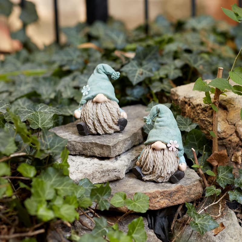 Set of 4 Gnome with Flower Christmas Tabletop Figurines 5.25"