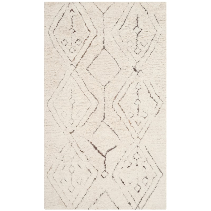 SAFAVIEH Casablanca Evdoxia Hand-tufted Tribal Area Rug