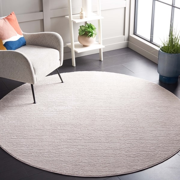 slide 2 of 8, SAFAVIEH Continental Theobalda Modern Rug 6'7" x 9' - Beige