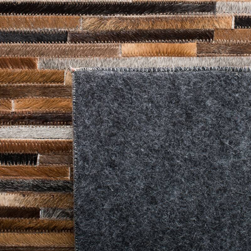 SAFAVIEH Handmade Studio Tobi Natural Hide Leather Rug